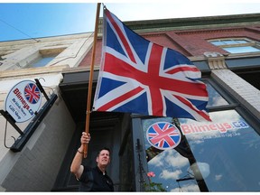 Carl Hulme, owner of Blimey's in Harrow, is shown on Friday, June 24, 2016. Hulme was reacting to the Brexit vote.