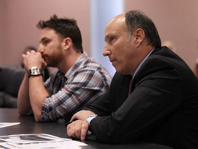 Darren Thorne and Michael Samhat (right) are seen during a city council meeting at city hall in Windsor on Tuesday, June 7, 2016.