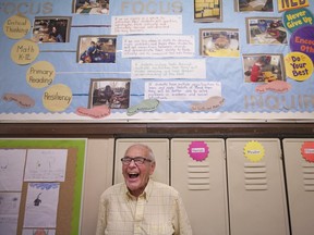 John Lawrus, 86, has a laugh as he reminisces with former students at the Gordon McGregor Public School open house, Saturday, June 18, 2016. The school is closing this month after 92 years.