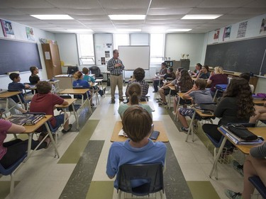 Students attend Paul Gelinas' Grade 9 academic math class at Harrow District High School on Thursday, June 16, 2016.  The school is to be closed for good after this school year.