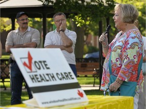 WINDSOR, ON. MAY 24, 2016 -  A group of union representatives hold a rally against health care cuts in front of the Windsor Regional Hospital Met Campus on Tuesday, May 24, 2016. Margot Dollar, a retired nurse speaks at the rally (DAN JANISSE/The Windsor Star) (For story by Craig Pearson)