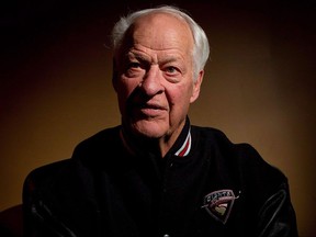 Hockey legend Gordie Howe poses for a photograph during an interview with The Canadian Press at the Vancouver Canucks and Detroit Red Wings NHL hockey game in Vancouver, B.C., on February 2, 2012. The man known as Mr. Hockey has died. Gordie Howe has died at age 88.