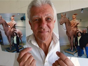Mark Williams shows photographs on June 6, 2016, of his sculpture of Chief Tecumseh on horseback.