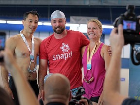 A media inner tube swim contest was held at the new WFCU Centre community pool on Wednesday, June 22, 2016, in Windsor. It was held to promote the FINA World Swimming Championships coming to the city later this year. The top finishers are silver medallist Bob Bellacicco, from CTV Windsor, left, Jeff Casey, from Snapd with the gold and Kelly Steele, from the Windsor Star with bronze.