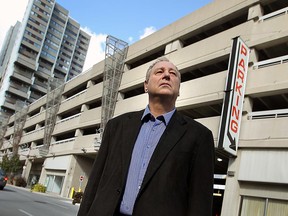 Property owner and Downtown Windsor BiA chairman Larry Horwitz outside the municipally-owned parking garage at 406 Pelissier St. in 2012.
