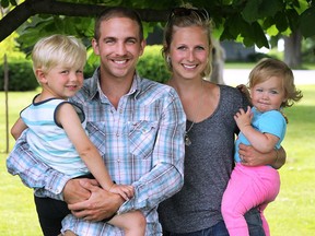 Ben and Beth Clark are shown with their children Honour, 4 and Journey, 1, at their Harrow home on Thursday, June 9, 2016. Beth is organizing a walk to raise awareness for postpartum depression.