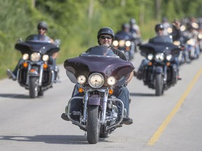 Participants in the sixth annual Bob Probert Memorial Ride make their way down Malden Road on Sunday, June 26, 2016.