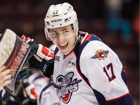 Defenceman Logan Stanley (17) of the Windsor Spitfires celebrates his goal against the Sarnia Sting on Dec. 28, 2015 at the WFCU Centre in Windsor, Ont.