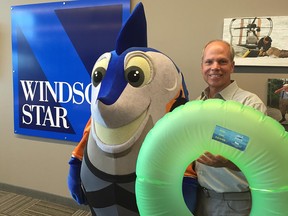 Windsor Star reporter Craig Pearson (right) with Splasher, mascot of the FINA World Swimming Championships in Windsor, 2016.