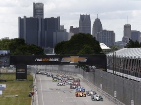 The field takes the green flag at the start of race two of the IndyCar Detroit Grand Prix auto racing doubleheader on Belle Isle in Detroit on June 5, 2016.
