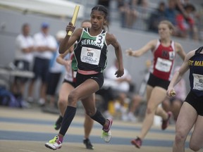 Herman's Taneidra Cain competes in the girls' 4x100-metre relay at the 2016 OFSAA track and field championships at Alumni Field at the University of Windsor on June 4, 2016.