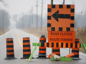 Road closure signs are pictured in this file photo.