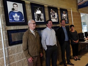 Marc Reaume, left, Derek Wilkinson, Andy Delmore and Arina Assim, the mother of D.J. Smith attend the unveiling of the sports Wall of Fame at the Vollmer Centre in LaSalle on Monday June 13, 2016.