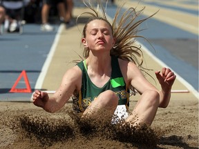 Jo-Jo Ertl from Sarnia St. Patrick's competes in the long jump during Day 1 of the OFSAA track and field championships at Alumni Field at the University of Windsor on June 2, 2016.