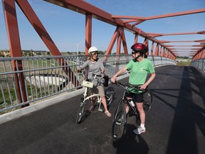 Windsor Star columnist Anne Jarvis, left, rides on the Herb Gray trail with Lori Newton from Bike Friendly Windsor Essex.