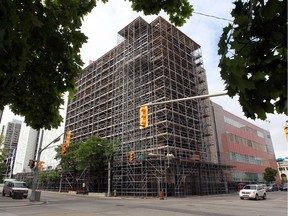 Restoration of the Paul Martin Building at the corner of Pitt Street and Ouellette Avenue can be seen on June 14, 2016.