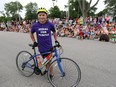 Chase Cartwright, 14, is all smiles just before leaving on his bike trip from Roseland public school  Windsor to Toronto to raise funds and awareness to fight epilepsy on behalf of his mother Judy Theriault.