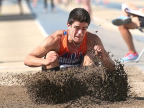 Evan John from Sandwich Secondary School wins the junior boy's long jump event at the OFSAA Track and Field Championships held at the University of Windsor on June 3, 2016.