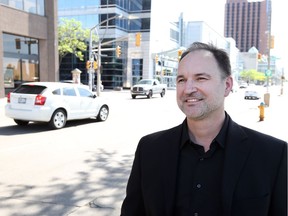 Architect John Hrovat stands along Riverside Drive in Windsor, Ont., on June 3, 2016.