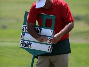 A golf official changes the leader board during the 2016 Ontario Women's Amateur Golf Championship at Ambassador Golf Club. Pointe West Golf Club will host this year's event.