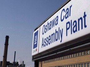 A sign outside Oshawa's General Motors car assembly plant is shown in Oshawa, Ont., Sept.17, 2012.