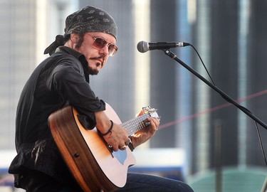 Jeff Martin of the Tea Party performs a solo acoustic set at the Bluesfest Windsor event at the Riverfront Plaza in Windsor, Ont. on Thursday, July 14, 2016.