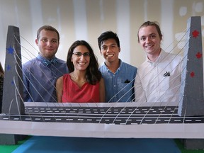 University of Windsor engineering students Jeremy Kacprzak, left, Rania Toufeili, Jeeric Penales and Chris Sweetingham present their proposed design for the Gordie Howe International Bridge to a panel of Windsor-Detroit Bridge Authority engineers  July 26, 2016.