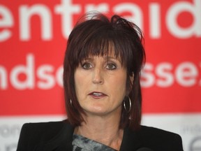 Lorraine Goddard, CEO of the local United Way, speaks during an event on Dec. 13, 2013.