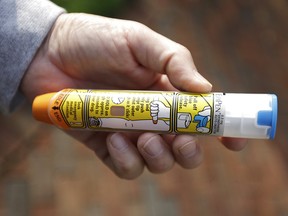 In an Oct. 4, 2013 file photo, an EpiPen is shown in Detroit.