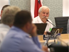 Essex Mayor Ron McDermott listens during a council meeting on July 18, 2016.