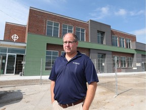 Tim Brady, pharmacist and owner of Brady's Pharmacy, is shown in front of what is soon to be a new medical complex on July 22, 2016 in Essex.