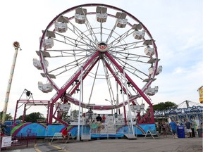 A ferris wheel takes passengers for a ride during the Essex Fun Fest  on July 7, 2016.