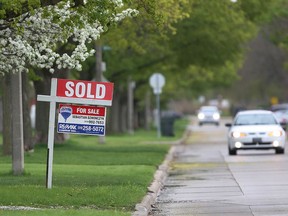 WINDSOR, ON. MAY 5, 2015. A sold sign is shown at a home on Westminster Boulevard on Tuesday, May 5, 2015, in Windsor, Ont. Local home sales are on the rise. (DAN JANISSE/The Windsor Star) (For story by Jesselyn Cook)