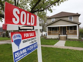 A sold sign is shown at a home on Westminster Boulevard on May 5, 2015. Local home sales are on the rise.