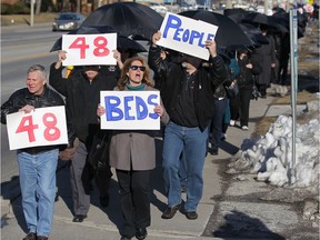 WINDSOR, ONT.:MARCH 4, 2013 -- Labour groups  join the Windsor Essex Health Coalition for a rally to save 48 hospital beds to ministry of health promised to fund, outside Windsor Regional Hospital, Monday, March 4, 2013.    (DAX MELMER/The Windsor Star)