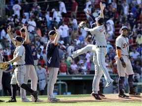 Detroit Tigers shortstop Jose Iglesias (1) jumps to celebrate their 4-3 victory over the Boston Red Sox after a baseball game at Fenway Park on July 27, 2016, in Boston.