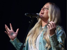 Artist Kesha sings "I Shall Be Released" at the Dylan Fest at Ryman Auditorium on Monday, May 23, 2016, in Nashville, Tenn. She will perform at the Colosseum at Caesars Windsor on July 28, 2016.