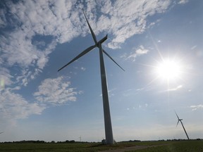 Wind turbines are shown in Lakeshore near the village of St. Joachim on Wednesday, July 13, 2016.