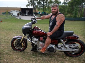 Harley-Davidson owner Brandon Goodfellow positions his ride at Seacliff Park  during Hogs for Hospice on July 29, 2016.