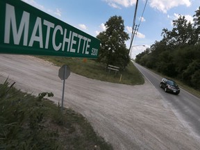 A car travels down Matchette Road near the Ojibway Nature Centre on July 14, 2016, in Windsor, Ont.