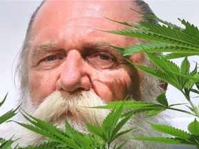 Jack Kungel is shown with some of the marijuana he grows at his Kingsville, Ont.