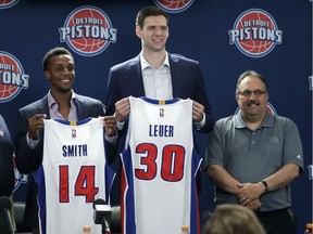 News Detroit Pistons players Ish Smith (14) and Jon Leuer (30) stand with Detroit Pistons President of Basketball Operations & Head Coach Stan Van Gundy, right, after being introduced to the media, Friday, July 8, 2016 in Auburn Hills, Mich.