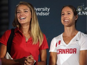 The University of Windsor held an Olympic send-off ceremony for three of their alumni on Tuesday, July 26, 2016. Runners Melissa Bishop, left, and Noelle Montcalm are shown during the ceremony.
