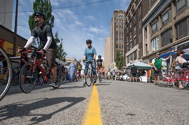 Cyclists and pedestrians in downtown Windsor enjoy 8km of streets closed to motor vehicles during Open Streets Windsor, Sunday, July 17, 2016.