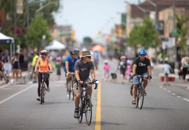 Cyclists and pedestrians in Walkerville enjoy 8km of streets closed to motor vehicles during Open Streets Windsor, Sunday, July 17, 2016.