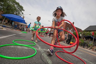 Ariana Rice, 11, competes in a game of hoola hoop tic tac toe in Walkerville for Open Streets Windsor, Sunday, July 17, 2016.