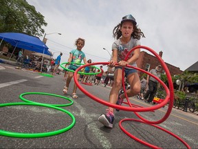 Ariana Rice, 11, competes in a game of hoola hoop tic tac toe in Walkerville for Open Streets Windsor, Sunday, July 17, 2016.