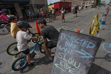 Bike Friendly Windsor Essex created a slow ride and protected bike lane in downtown Windsor for Open Streets Windsor, Sunday, July 17, 2016.