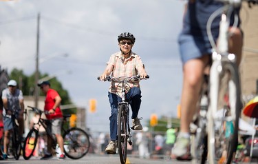 Cyclists and pedestrians in downtown Windsor enjoy 8 km of streets closed to motor vehicles during Open Streets Windsor, Sunday, July 17, 2016.