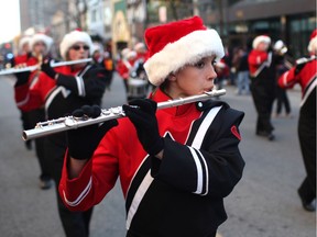 The he Windsor Optimist Youth Band performs during the Holiday Parade on Ouellette Ave., Saturday, Nov. 30, 2013.